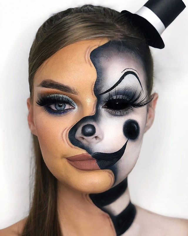 Half clown face makeup with intricate design and hat detail, showcasing artistry and creativity.