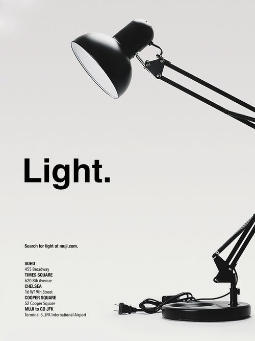 Black adjustable desk lamp with Light. text. Visit muji.com for more info. Store locations listed below.