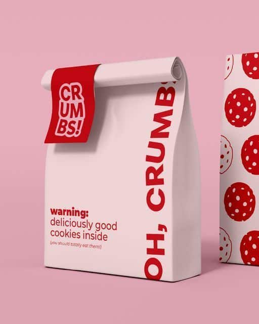 Cookie packaging with red and white design on pink background, labeled deliciously good cookies inside.