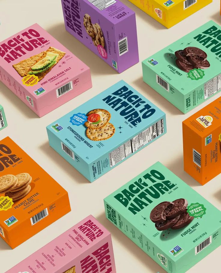 Colorful Back to Nature snack boxes in various flavors, including fudge mint and stoneground wheat, on a light background.