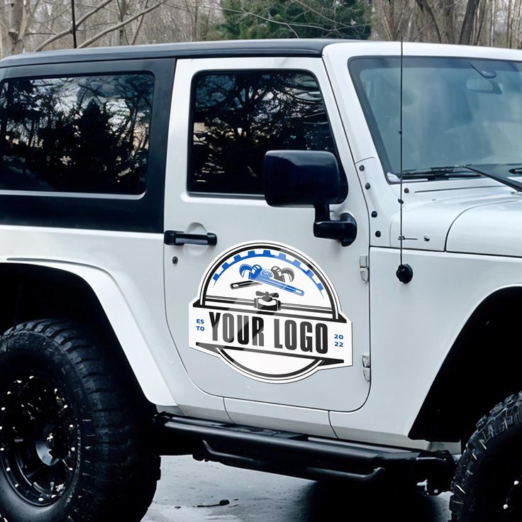 White SUV with a custom logo on the door, representing a business advertisement opportunity.