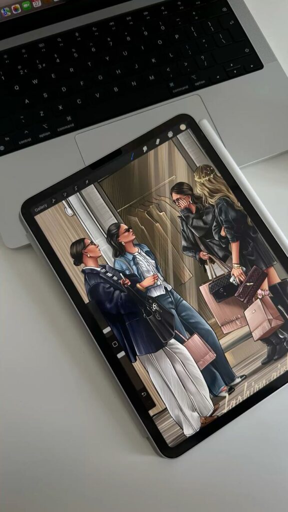 Fashion illustration Tablet showing stylish women shopping illustration on desk with laptop. | Sky Rye Design Tablet showing stylish women shopping illustration on desk with laptop.