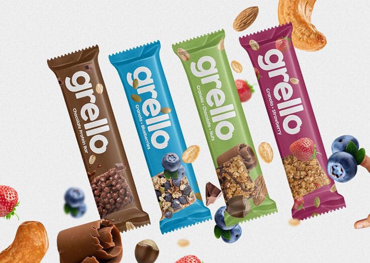 Flow-Wrapping Four Grello granola bars: chocolate, blueberry, nuts, and strawberry flavors with scattered nuts and berries. | Sky Rye Design Four Grello granola bars: chocolate, blueberry, nuts, and strawberry flavors with scattered nuts and berries.