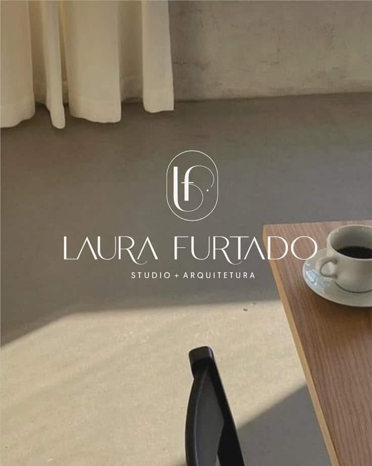 Modern interior design featuring a coffee cup on a table with Laura Furtado Studio + Arquitetura logo.