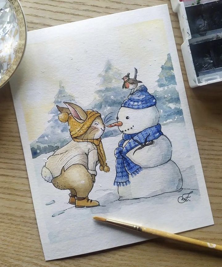 Kerstkaart Cute winter illustration of a bunny in a hat, playfully greeting a snowman with a bird on its head in a snowy forest. | Sky Rye Design Cute winter illustration of a bunny in a hat, playfully greeting a snowman with a bird on its head in a snowy forest.