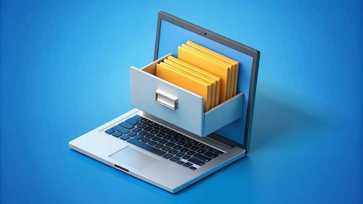 Laptop with virtual file drawer extending from the screen, representing digital file management on a blue background.