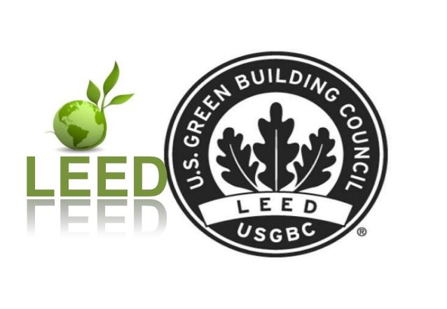LEED logo with green globe and U.S. Green Building Council emblem, promoting sustainable architecture certification.