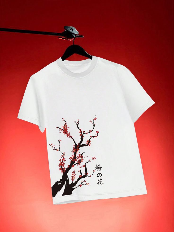White T-shirt with red cherry blossom design hanging on a black hanger against a red background.