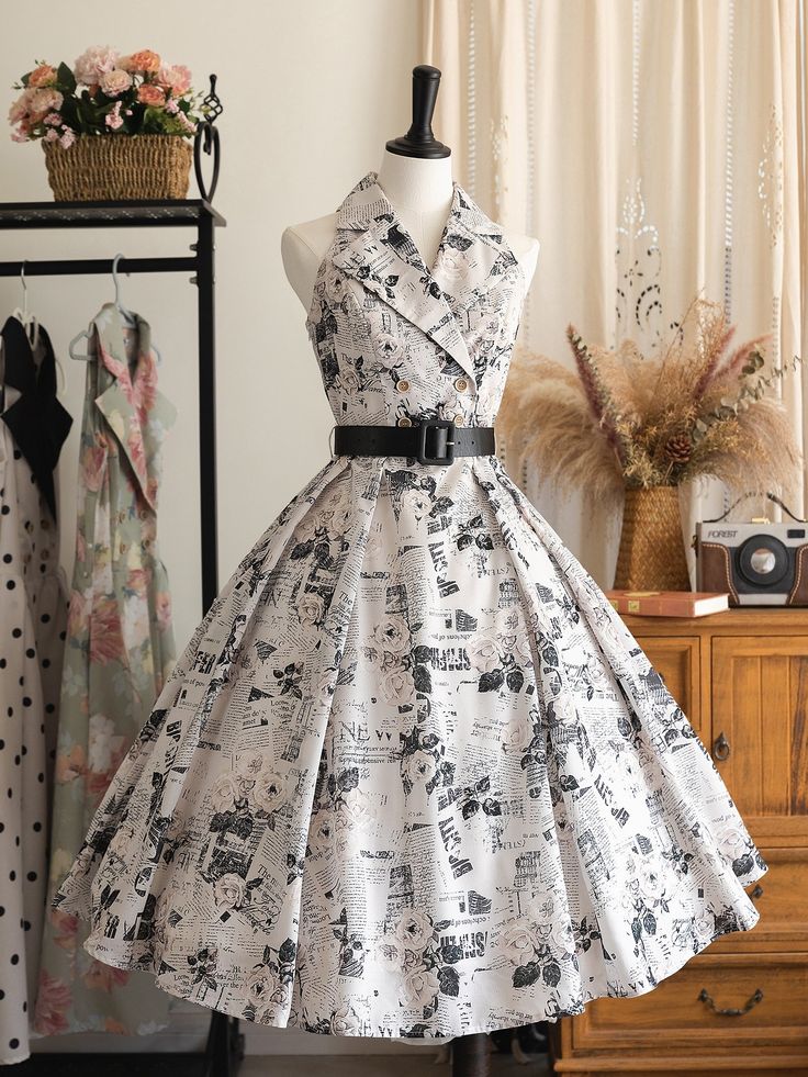 Vintage newspaper print dress on a mannequin in a stylish retro room setting.