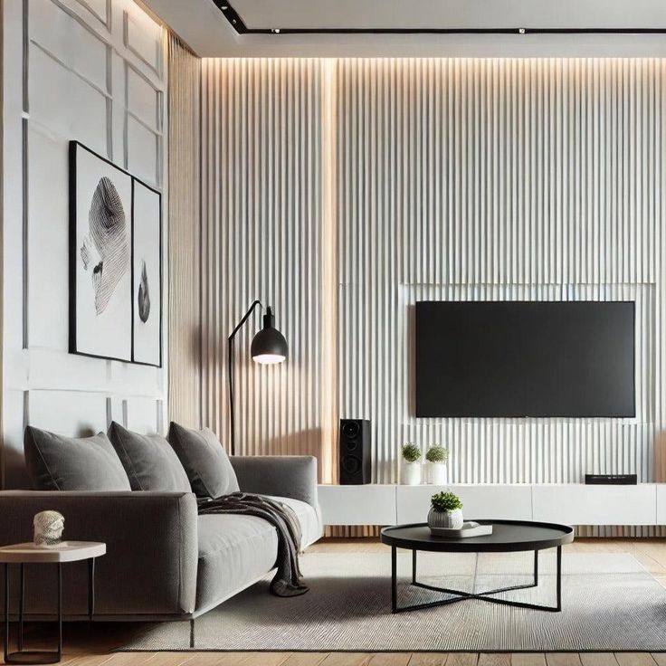 Nroro - Ivory Oak 62A - Slat Wall Ceiling Panel - PVC Decor Modern living room with gray sofa, art, flatscreen TV, and chic decor. Stylish interior design with vertical paneling. | Sky Rye Design Modern living room with gray sofa, art, flatscreen TV, and chic decor. Stylish interior design with vertical paneling.