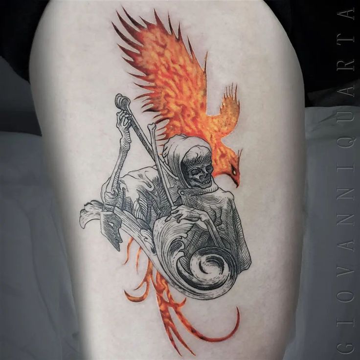 Tattoo of Grim Reaper with vibrant phoenix, merging themes of death and rebirth in artistic design.