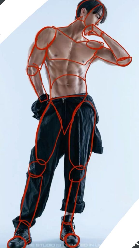 Shirtless man with anatomical lines, wearing black pants and shoes, posing against a light background.