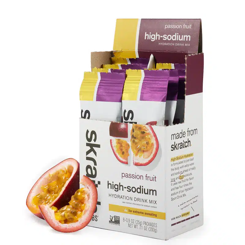 SDM-PF-22G-ingredients_3f9bdd55-aee1-4651-962e-2d8d22480425_800x High-sodium passion fruit hydration drink mix in a box with fresh passion fruit beside it. | Sky Rye Design High-sodium passion fruit hydration drink mix in a box with fresh passion fruit beside it.