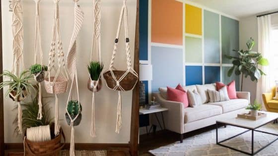 Viewing Deck Blog - 2025-09-02T103831067 Stylish living room with colorful wall panels, macramé plant hangers, cozy sofa, and modern decor elements. | Sky Rye Design Stylish living room with colorful wall panels, macramé plant hangers, cozy sofa, and modern decor elements.