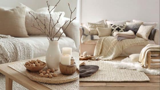 Cozy living room with beige decor, soft pillows, knitted blankets, and candles on a wooden table with walnuts.