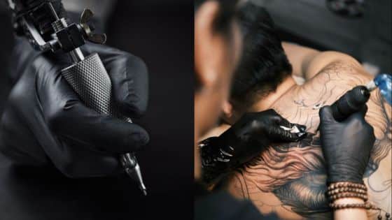 Tattoo artist using machine on client's back, creating detailed black ink artwork with gloves for precision and hygiene.