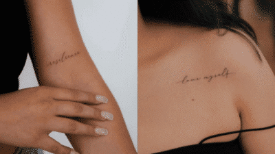 Minimalist script tattoos on arm and shoulder with words resilience and love myself in elegant font.