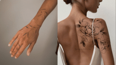 Floral tattoos on arm and shoulder, showcasing intricate line art designs on skin.