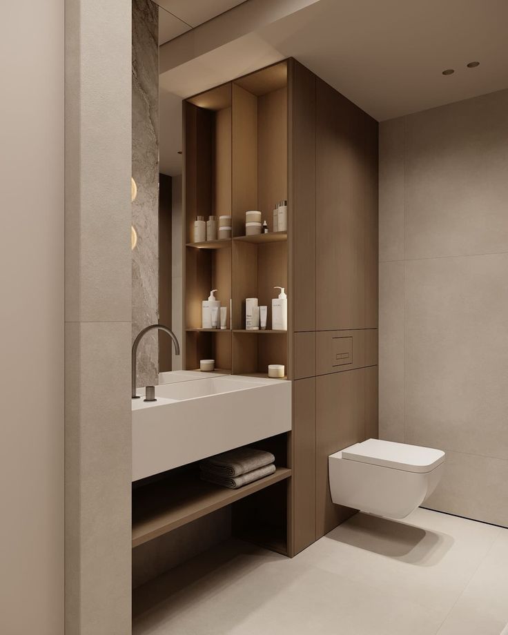 Would you start and end your day in this peaceful bathroom___Follow zenqarchitecture for more__By _mora_design_studio_ Modern minimalist bathroom with floating sink, wooden shelving, and wall-mounted toilet. Neutral tones and sleek design. | Sky Rye Design Modern minimalist bathroom with floating sink, wooden shelving, and wall-mounted toilet. Neutral tones and sleek design.