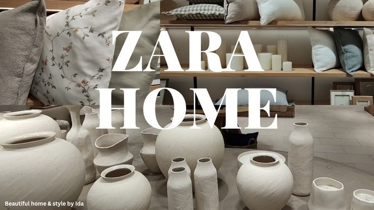 Zara Home decor display with ceramic vases, pillows, and candles on shelves. Cozy and stylish interior design elements.
