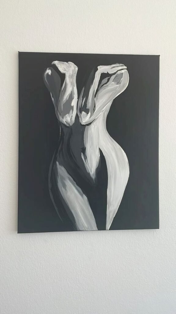 Abstract monochrome painting of a female torso on a black background, emphasizing flowing white and gray brushstrokes.