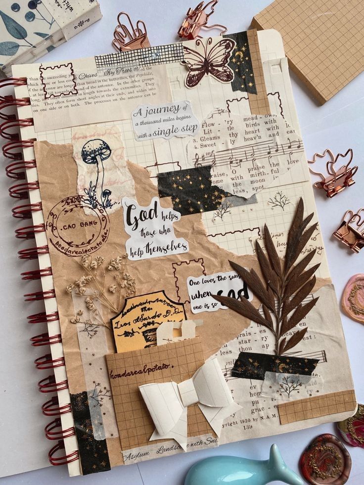 Decorative journal cover with vintage papers, quotes, and embellishments like a butterfly, dried leaves, and a bow.