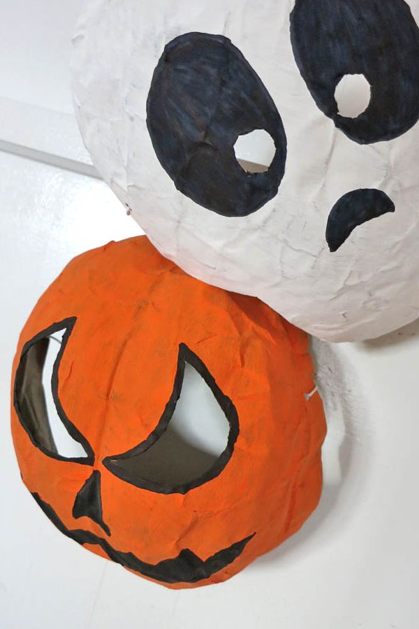 a51f62c53cc72e1e6a648c01f255b3a4 Halloween paper mache masks: a sad ghost in white and a grinning jack-o'-lantern in orange. | Sky Rye Design Halloween paper mache masks: a sad ghost in white and a grinning jack-o'-lantern in orange.