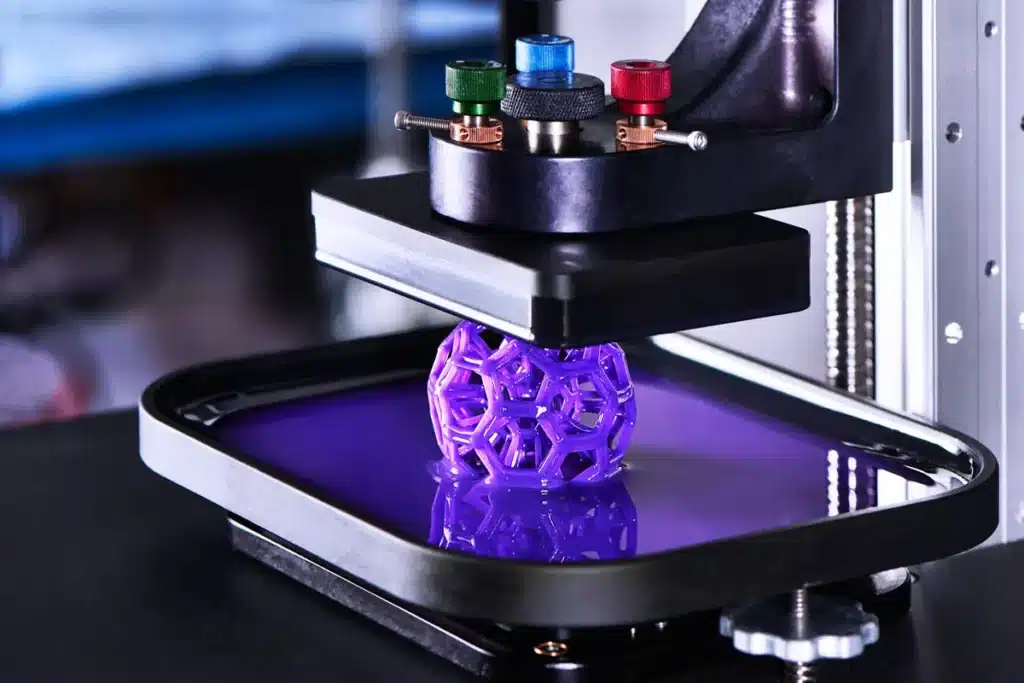 3D printer creating a complex purple geometric structure with precision technology.