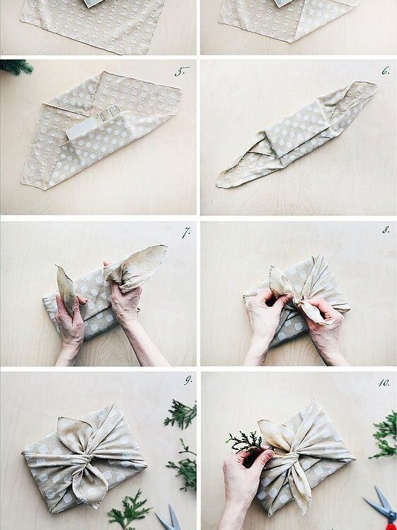 Step-by-step guide to wrapping a gift with fabric, featuring a bow and decorative greenery.