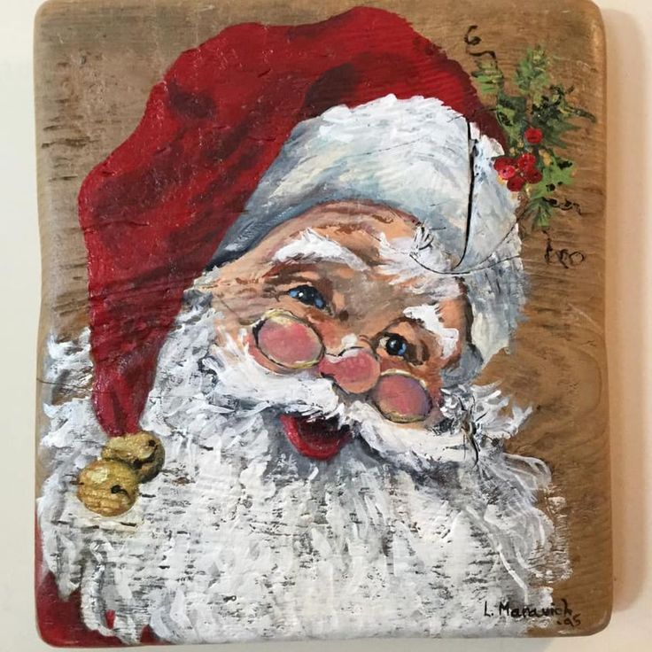 Festive Santa Claus painting on wood with red hat and bell, smiling warmly. Perfect Christmas decor for holiday cheer.