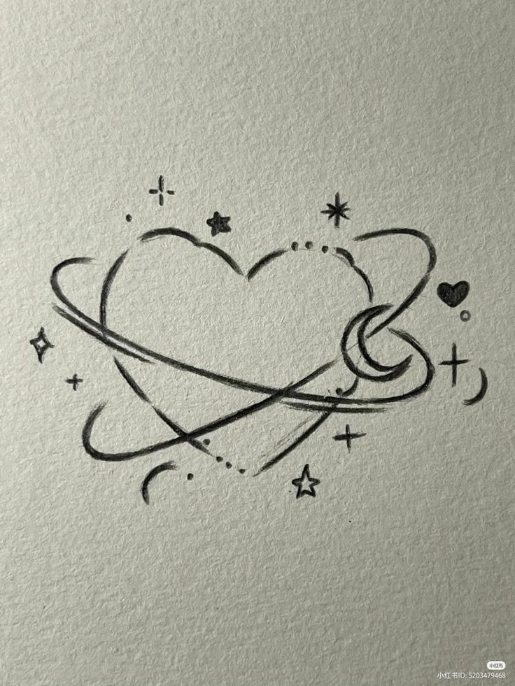 Heart-shaped doodle with stars, crescent moon, and orbit lines on textured paper background.