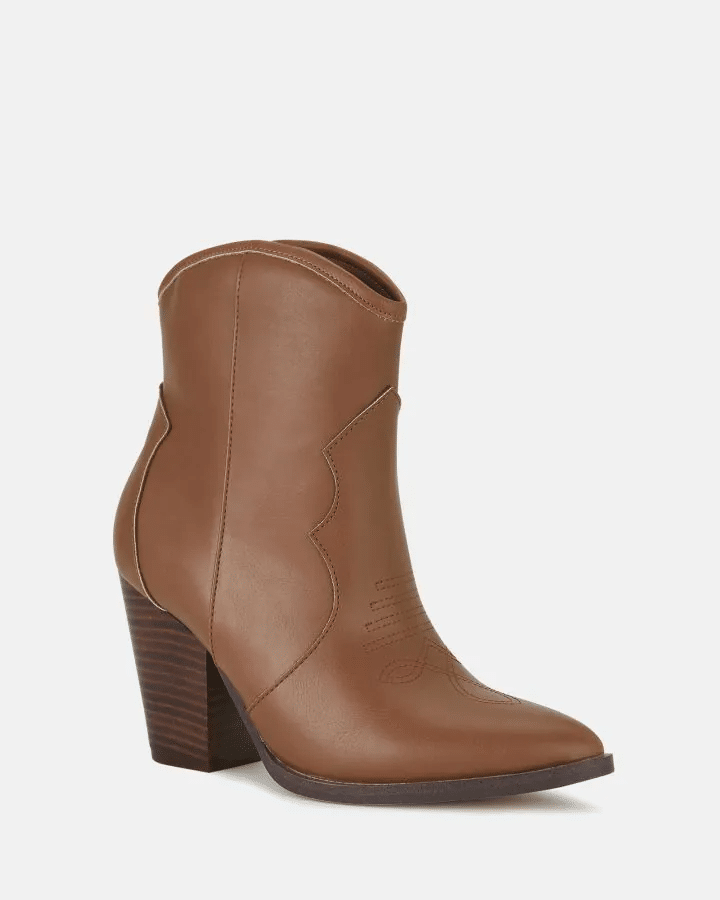 Brown leather ankle boot with block heel, side stitching, and Western style on a plain white background.