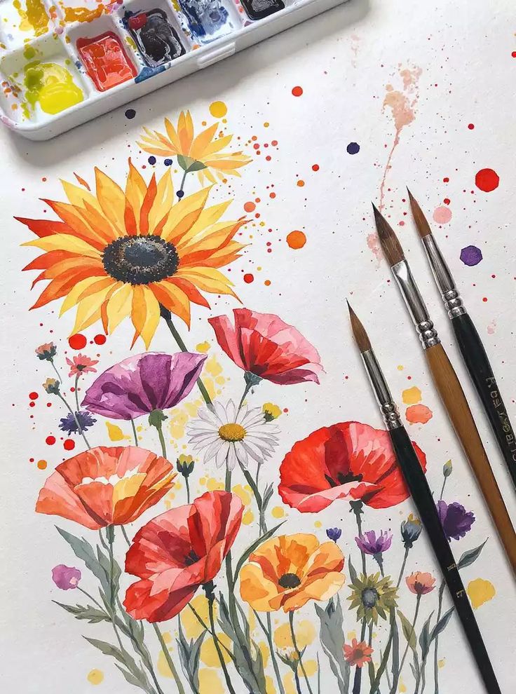 Азбука Цвета _ Акварельный рисунок для начинающих Watercolor painting of vibrant flowers with paintbrushes and a paint palette nearby. | Sky Rye Design Watercolor painting of vibrant flowers with paintbrushes and a paint palette nearby.