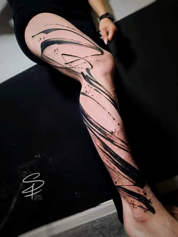 Тату перекрытие шрама абстракция Abstract black ink tattoo design on a leg, featuring bold and swirling lines for a striking artistic look. | Sky Rye Design Abstract black ink tattoo design on a leg, featuring bold and swirling lines for a striking artistic look.