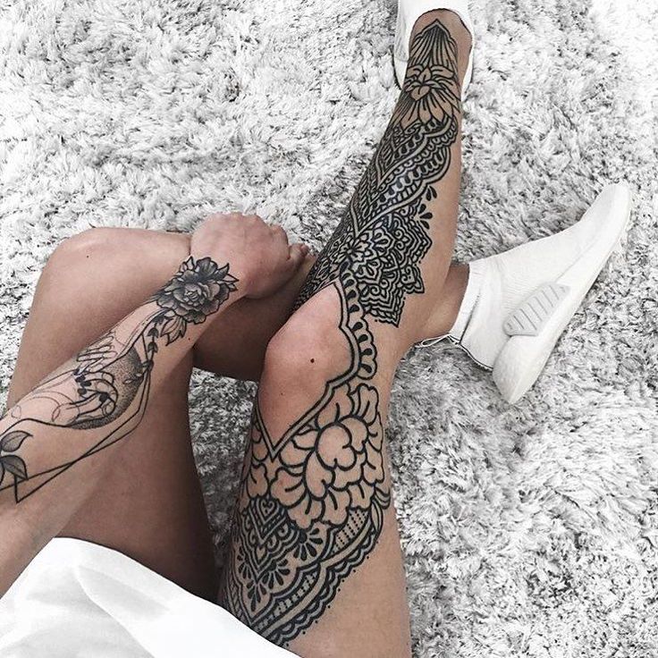 ℌ𝔞𝔫𝔫𝔞𝔥 𝔐𝔬𝔫𝔱𝔢 on Instagram_ Healed thanks xjeannyx 🙏🏼ellementaltattoos dotworkers dotwork Ornate leg and arm tattoos on person wearing white sneakers, resting on a plush carpet. | Sky Rye Design Ornate leg and arm tattoos on person wearing white sneakers, resting on a plush carpet.