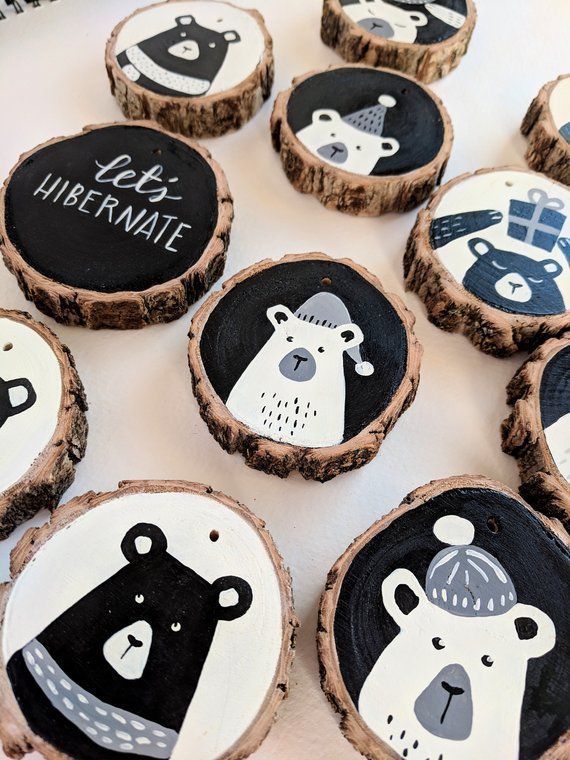 0a2533fb-78bf-4460-9e9b-966439dce1ea Wood slice ornaments featuring cute bear illustrations and let's hibernate message in black and white. | Sky Rye Design Wood slice ornaments featuring cute bear illustrations and let's hibernate message in black and white.