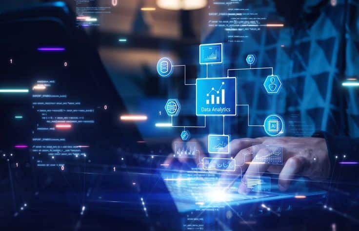Hands typing on laptop with digital data analytics graphics overlay, illustrating technology and big data concepts.