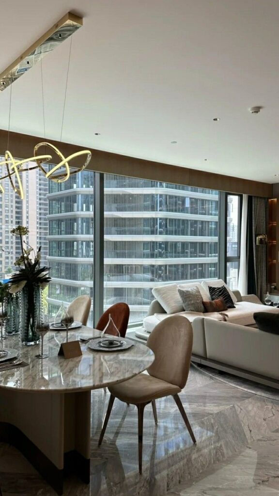 _ 1 Modern living room with city view, elegant furniture, and stylish lighting. Perfect for urban home inspiration. | Sky Rye Design Modern living room with city view, elegant furniture, and stylish lighting. Perfect for urban home inspiration.