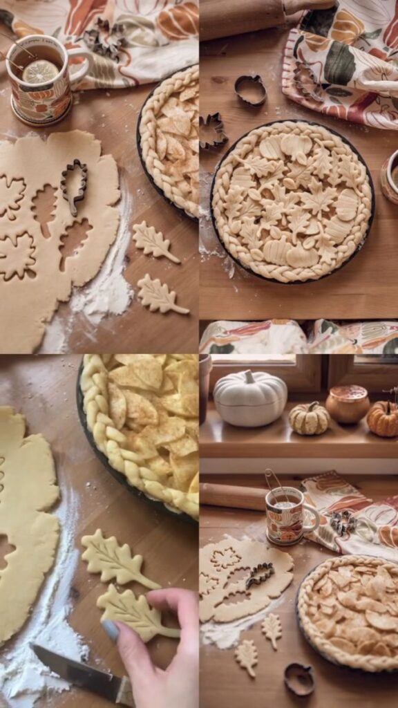 Autumn-themed pie making with leaf-shaped dough cutouts, surrounded by fall decor and spices on a wooden table.