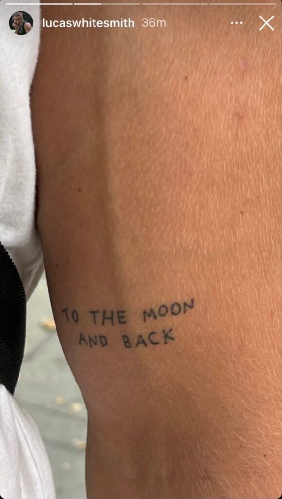 11a6772d9f8597f7511539be168c50dc Arm tattoo reading To the moon and back in black ink, close-up view. | Sky Rye Design Arm tattoo reading To the moon and back in black ink, close-up view.