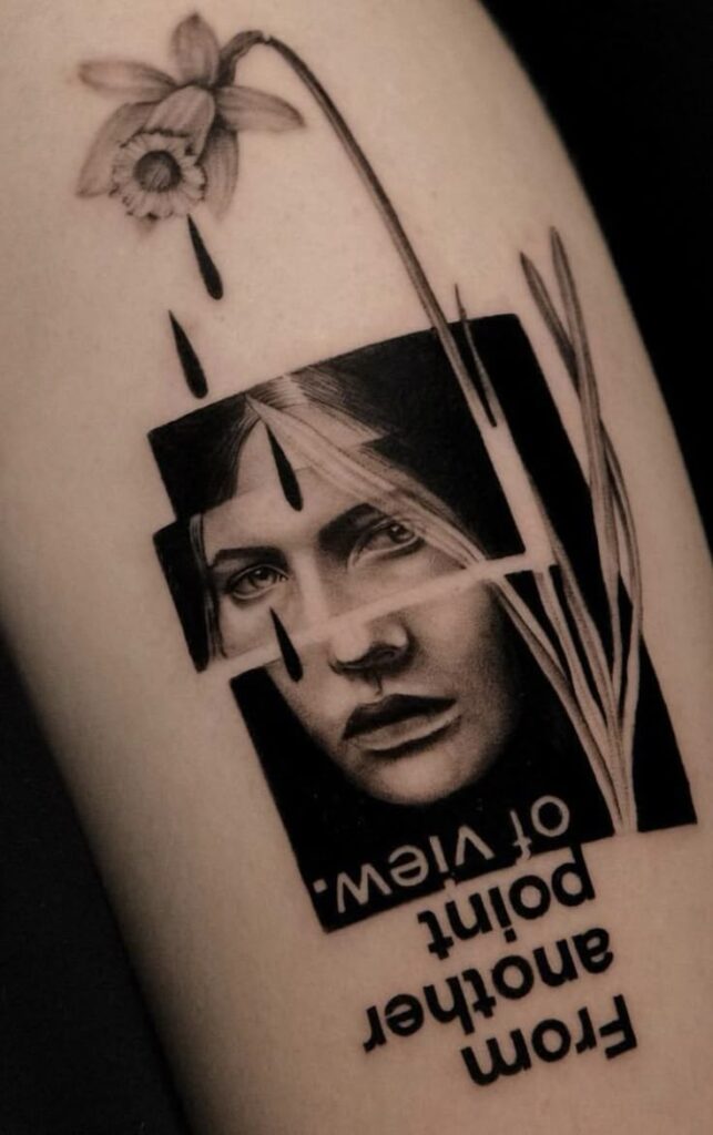 Tattoo featuring a woman's face with a daffodil and text: From another point of view.