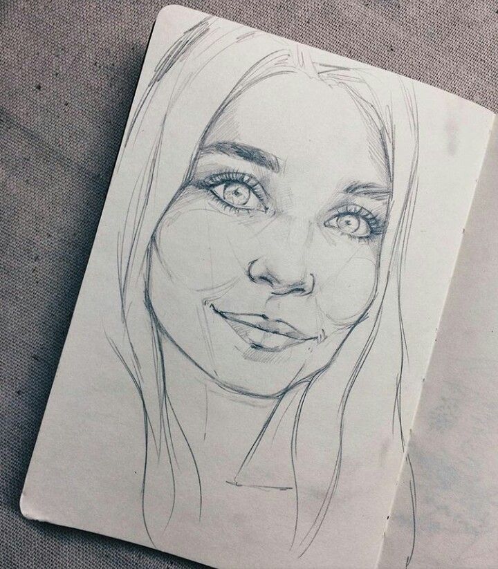 163bb6b4e188ca51ee12b9e217ef5609 Pencil sketch of a smiling woman's face on a notebook, showcasing detailed eyes and hair. | Sky Rye Design Pencil sketch of a smiling woman's face on a notebook, showcasing detailed eyes and hair.