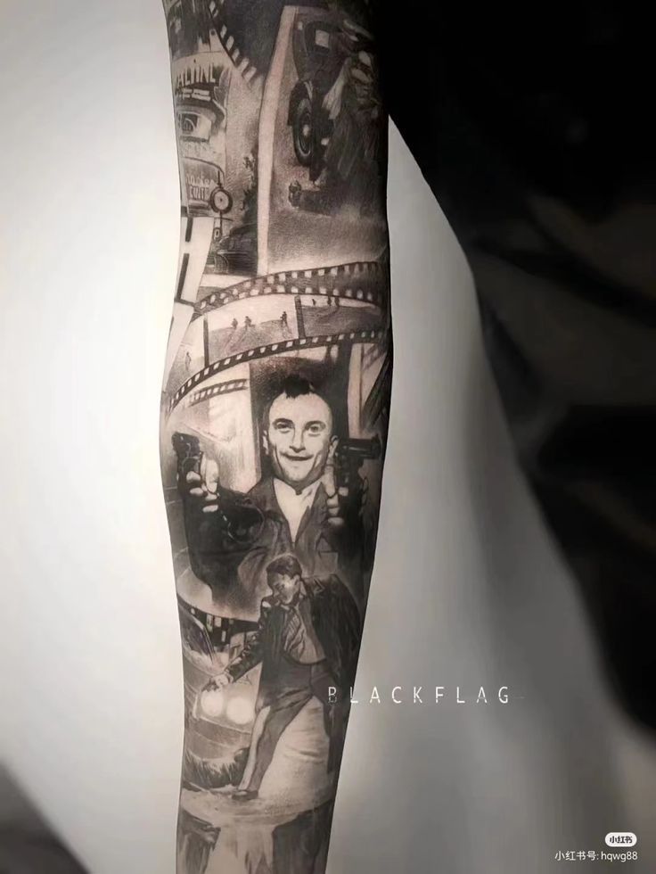 Black and white sleeve tattoo featuring a film reel, classic cars, and action movie scenes on a person's arm.