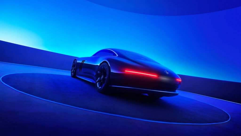 1760449326911 Sleek futuristic blue sports car in a glowing modern setting with vibrant neon lighting. | Sky Rye Design Sleek futuristic blue sports car in a glowing modern setting with vibrant neon lighting.