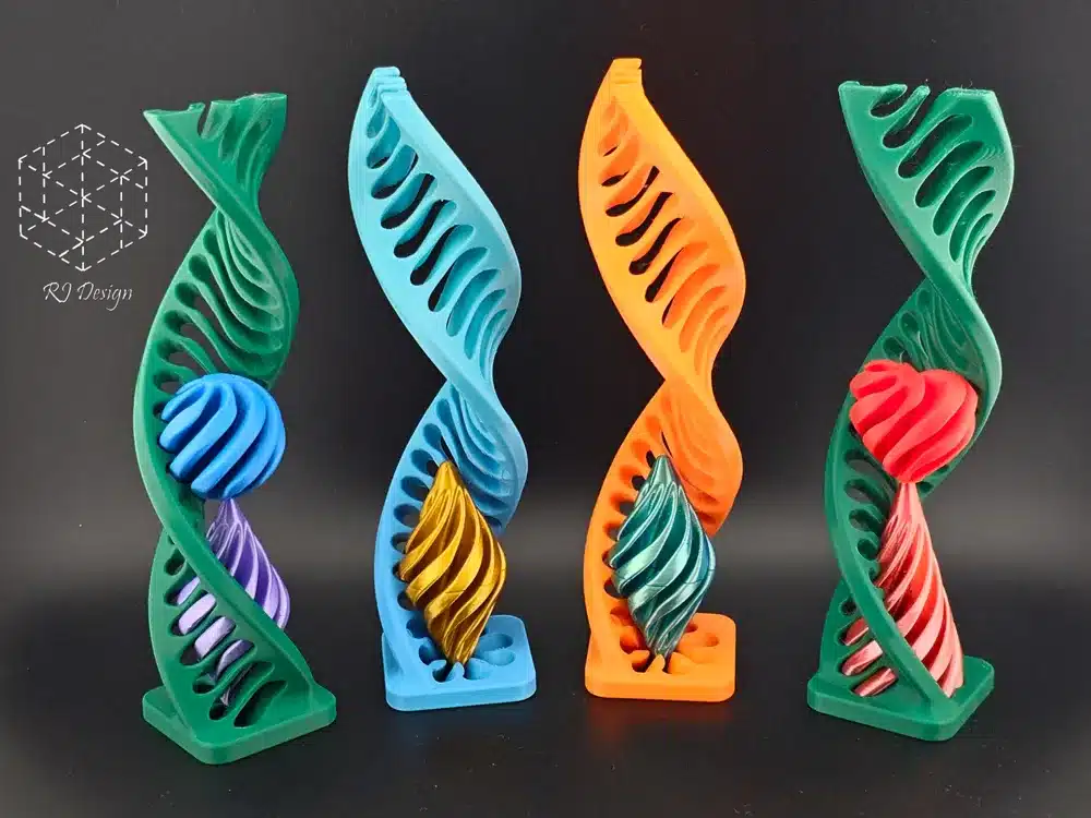 2025-03-11_7769eda0a6834 Colorful 3D-printed DNA sculpture collection with vibrant patterns and geometric design by RJ Designs. | Sky Rye Design Colorful 3D-printed DNA sculpture collection with vibrant patterns and geometric design by RJ Designs.