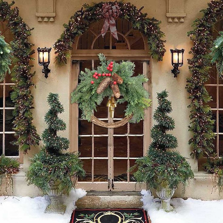 2025 Christmas Wreath Boho Wreath Christmas Day Wreath Home Decoration Door Wall Decoration Elegant holiday entrance with festive wreath, garlands, and topiary trees adorned with lights on a snowy doorstep. | Sky Rye Design Elegant holiday entrance with festive wreath, garlands, and topiary trees adorned with lights on a snowy doorstep.