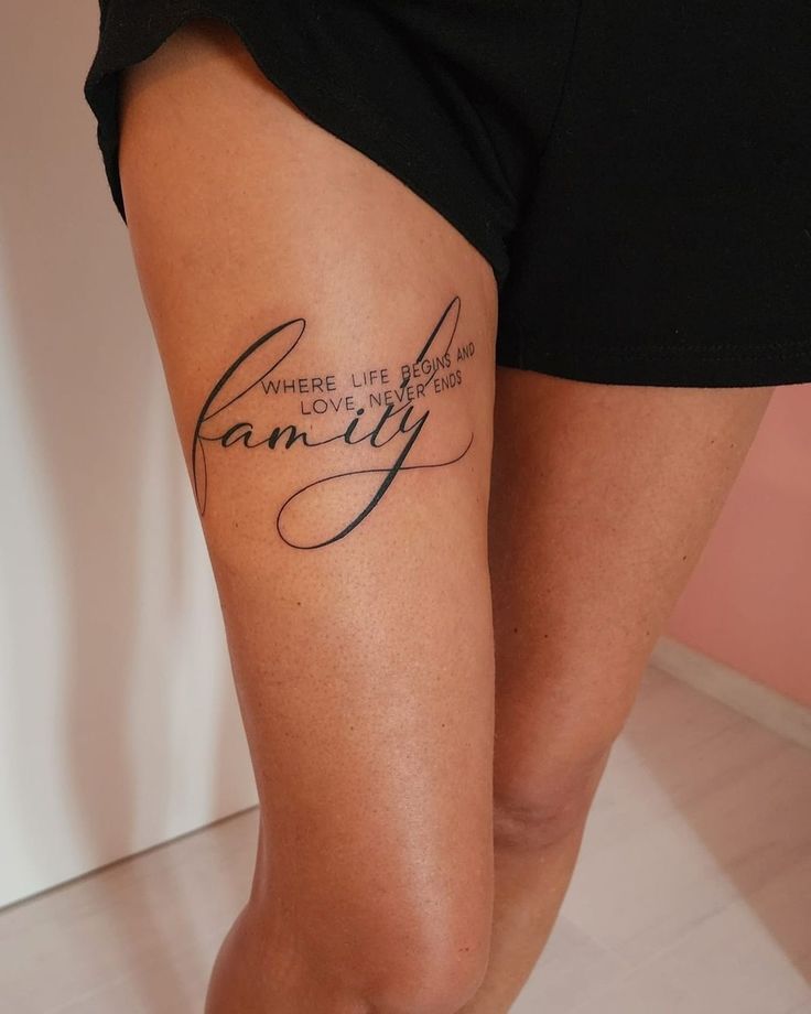 _ 26 Thigh tattoo reads family with quote: Where life begins and love never ends. Black ink on skin. | Sky Rye Design Thigh tattoo reads family with quote: Where life begins and love never ends. Black ink on skin.