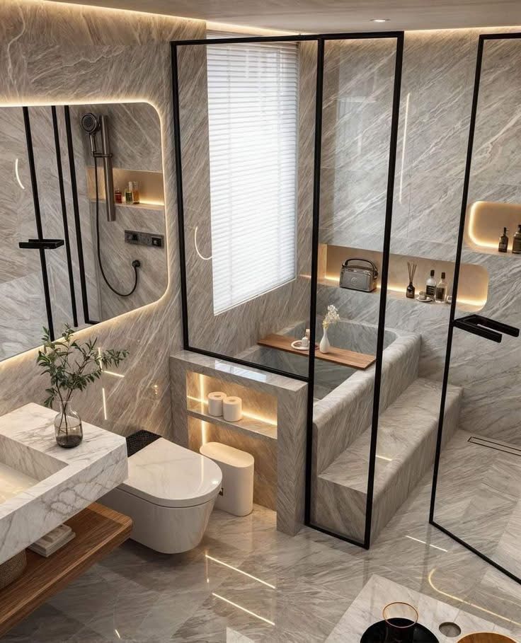 Modern luxury bathroom with marble design, glass shower, and elegant lighting.