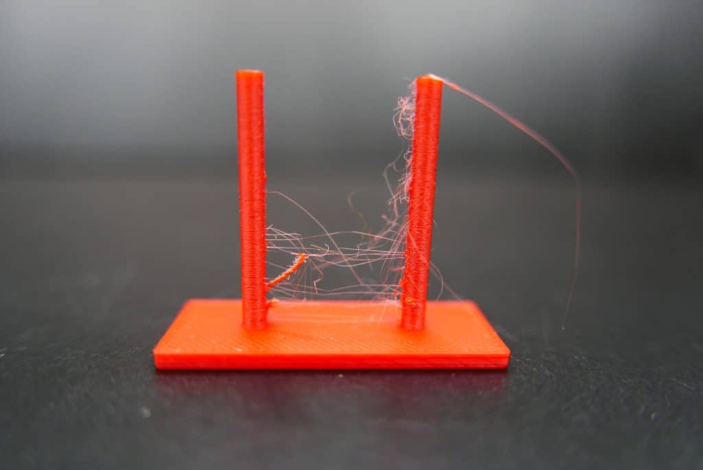 3-1024x685 3D print stringing issue with red filament on a small test model. | Sky Rye Design 3D print stringing issue with red filament on a small test model.