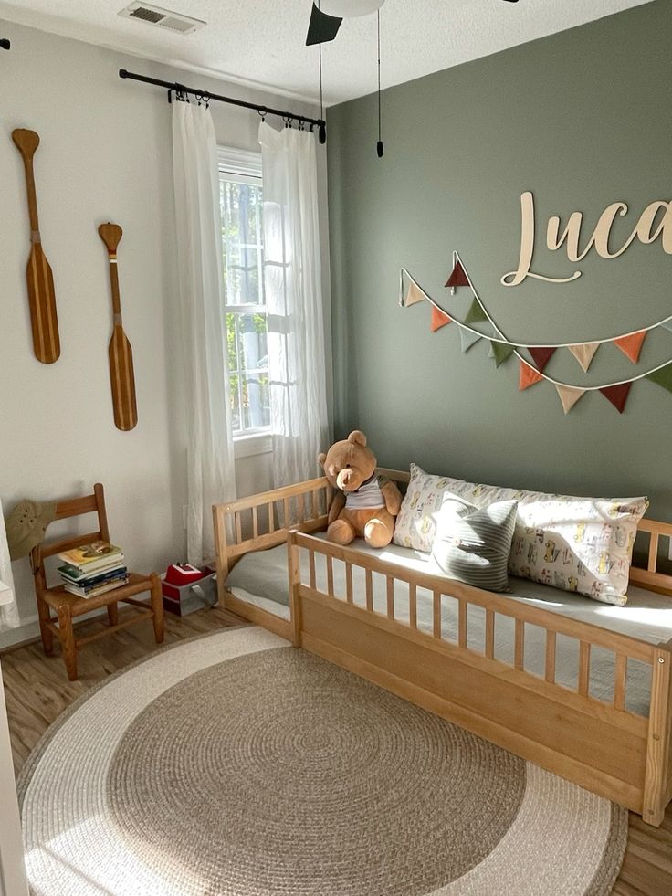 4793b229ccdcaf93d3376deb6b93955d Cozy children's room with wooden bed, playful decor, and sunlight streaming through a window. | Sky Rye Design Cozy children's room with wooden bed, playful decor, and sunlight streaming through a window.
